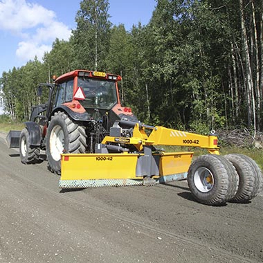 MeriGrader maintaining gravel road